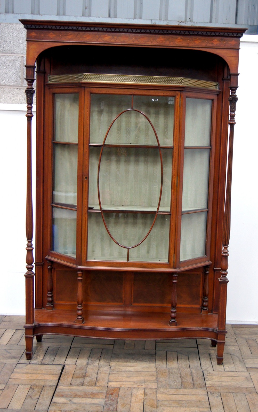 a very unusual edwardian inlaid cabinet