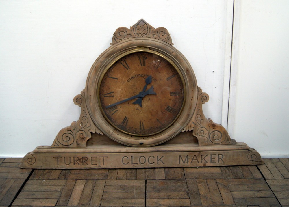 a very unusual pine 'turret clock makers' clock