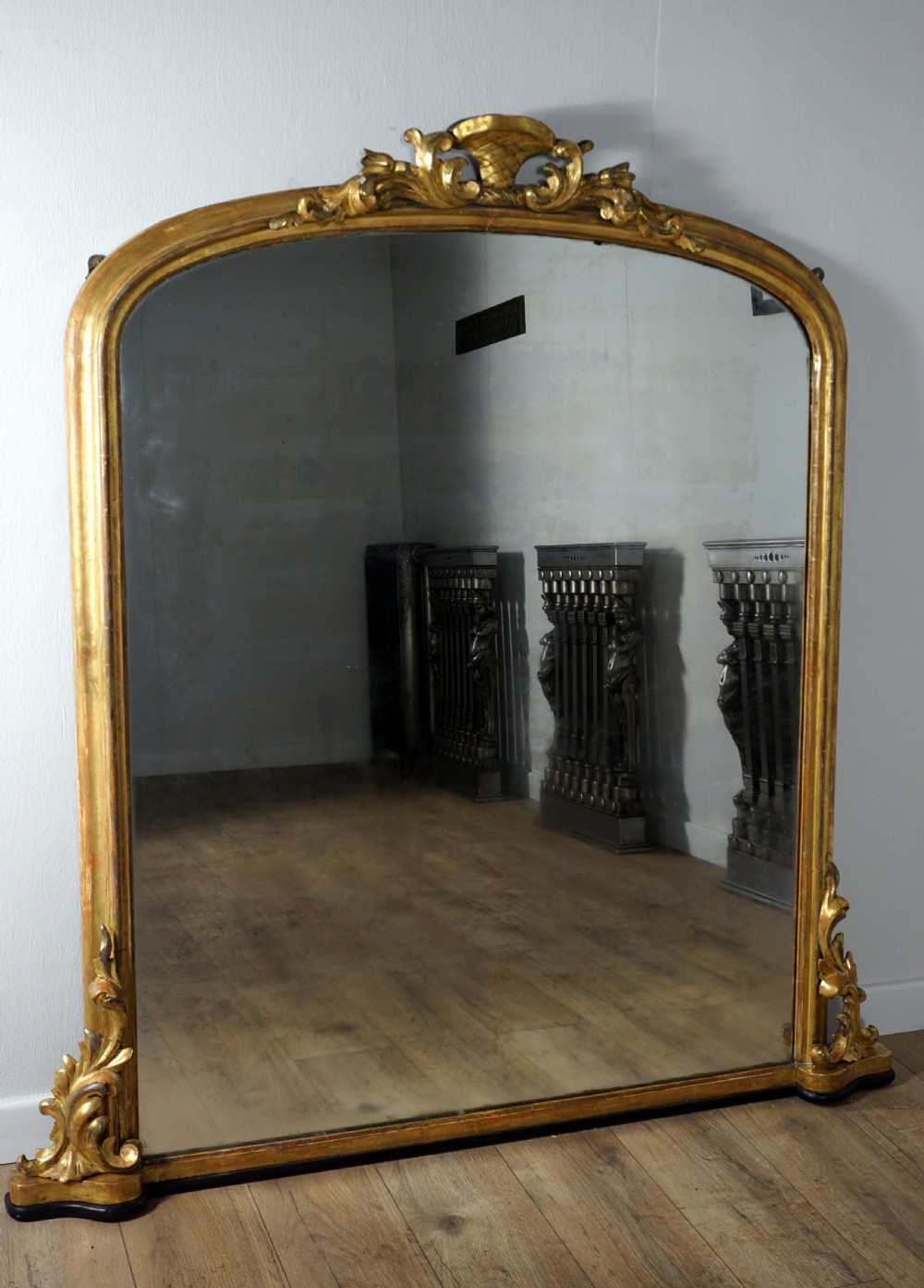 a good carved and gilded regency english overmantle mirror