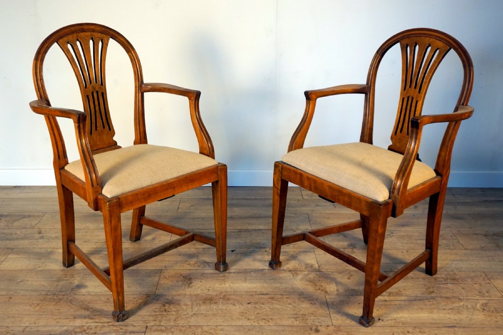 a pair of birch and elm armchairs