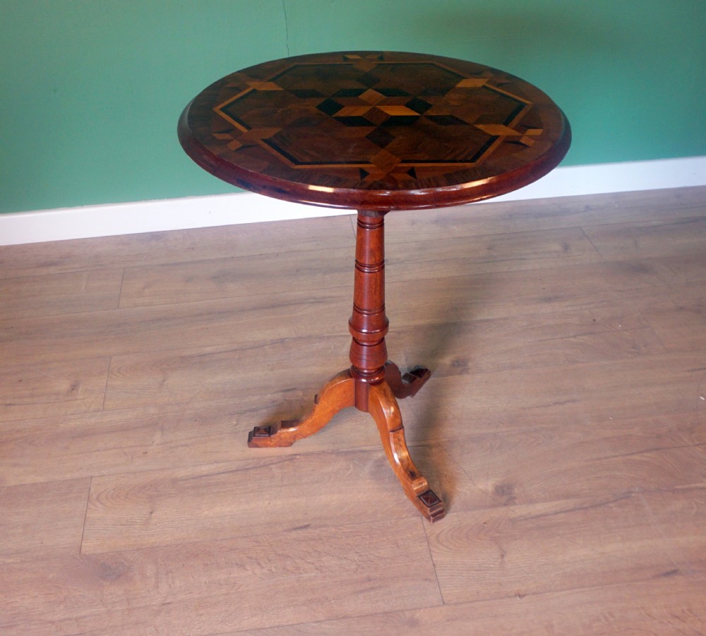 an absolutely stunning tripod tilt top specimen wood inlaid table