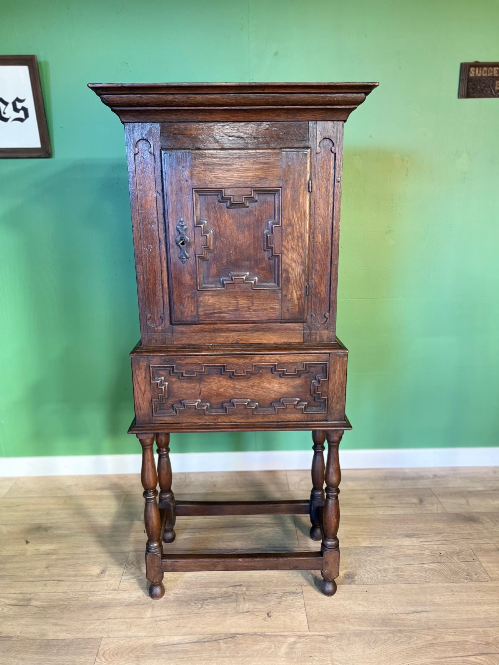 a charming 18th century oak cupboard on stand