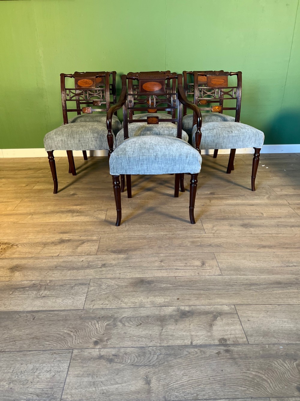 a good set of 6 regency stand chairs and 1 carver chair