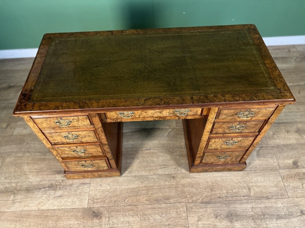 a charming burr walnut victorian gillows of lancaster leather top writing desk