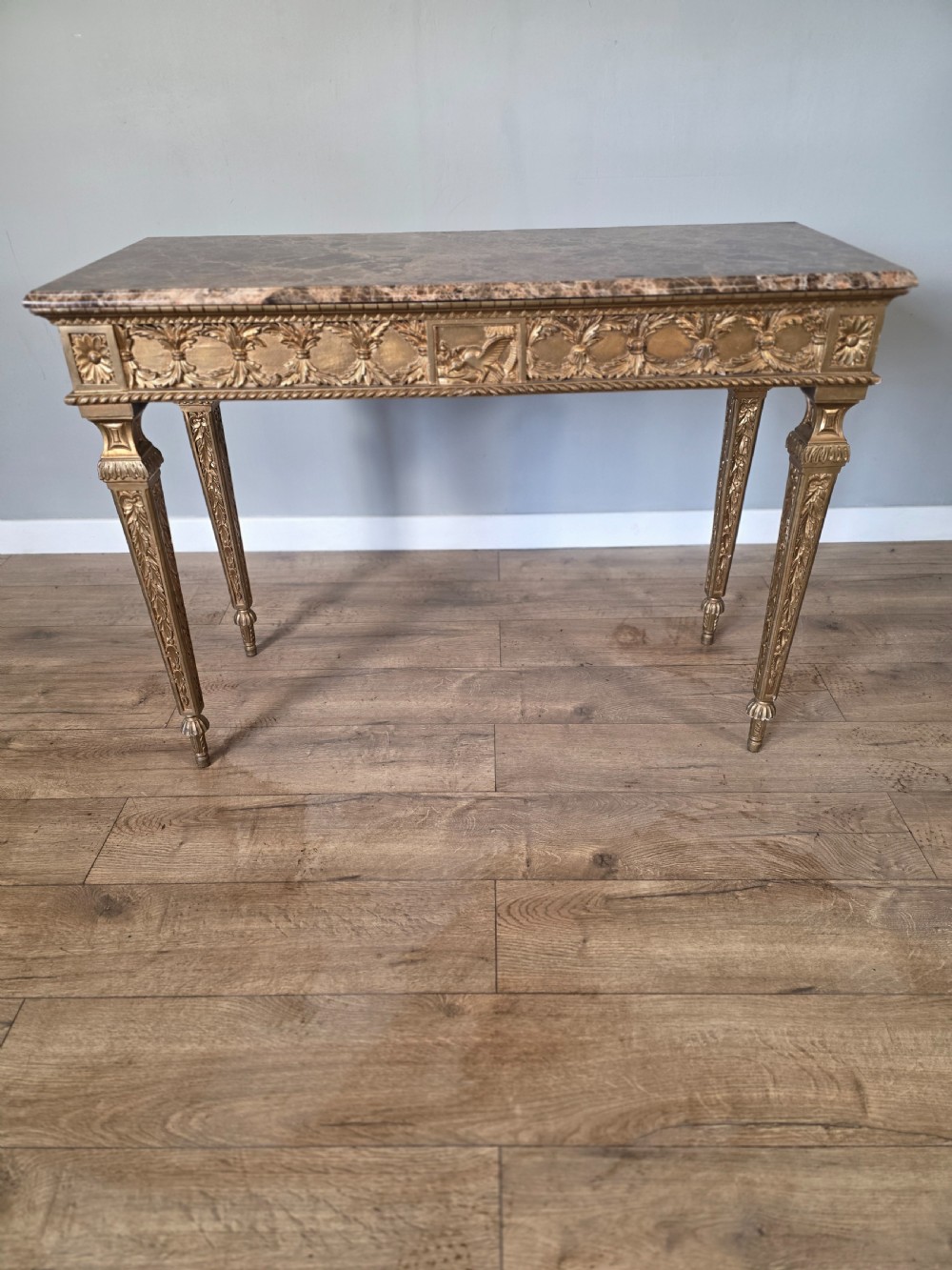 midcentury console table in marble and gilded wood